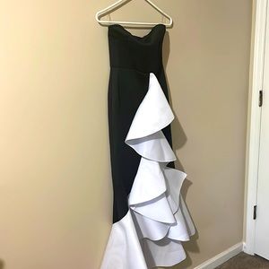 Never worn; still has the tag; Miss Ord Formal dress.